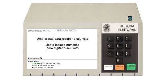Print da tela do simulador de votação, mostrando o desenho de uma urna eletrônica com orientaçõe...